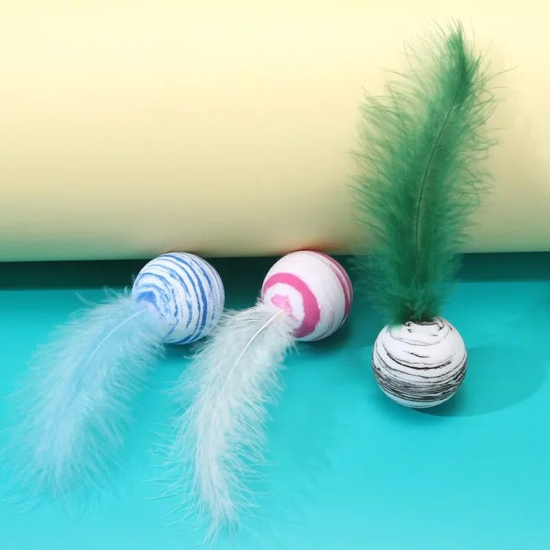 Feathers bell Bouncing Pet Toy Ball - Rubber🤸🦘